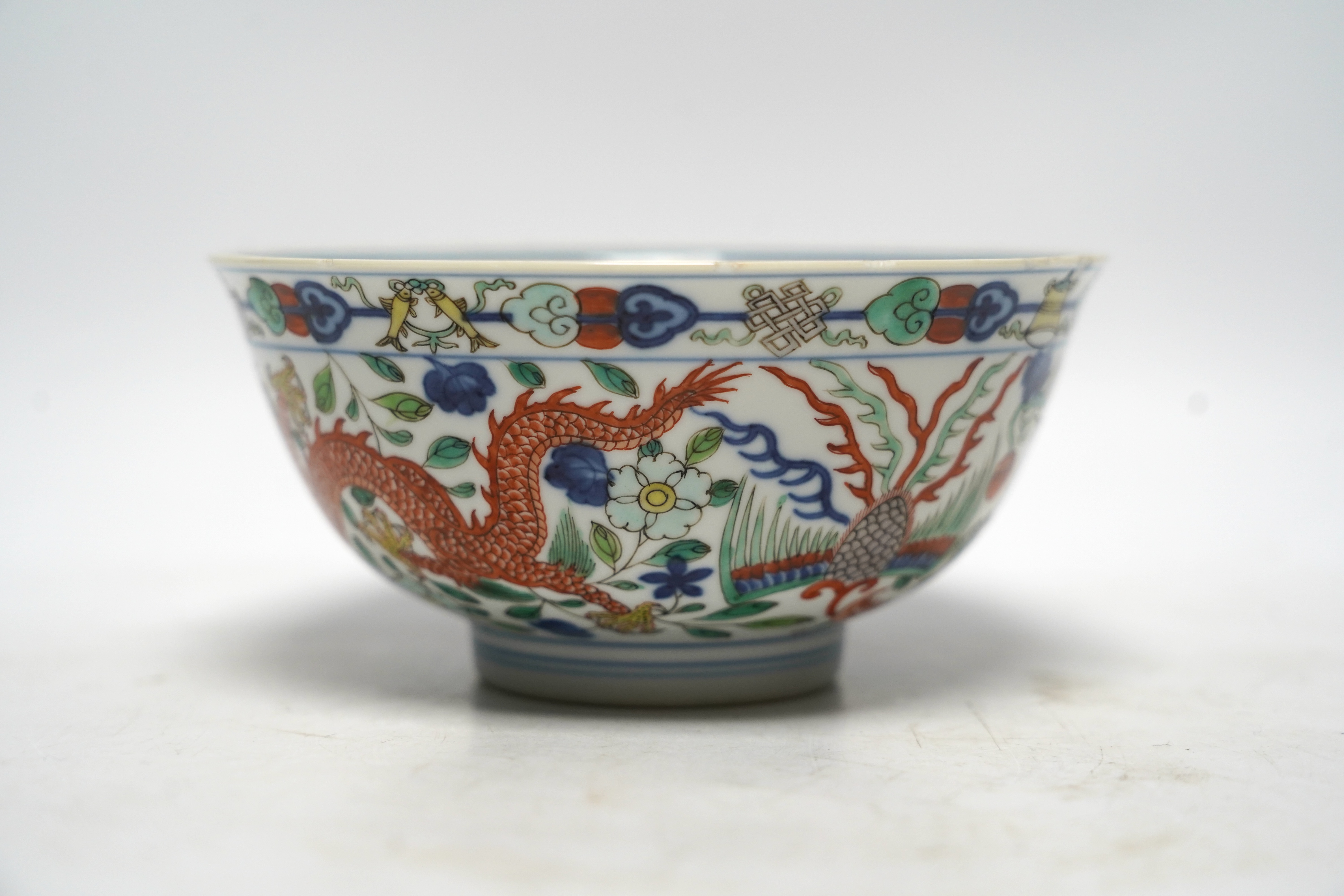 A Chinese wucai ‘dragon and phoenix’ bowl, early 20th century, diameter 15cm